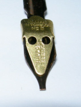 Underside of Dip pen nib showing correct placement of fitted reservoir